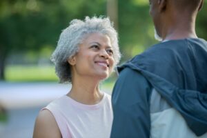 Older woman looks up lovingly at her husband. These are the 5 things women want from their man