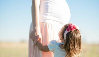 Confident, pregnant woman knows you can save your marriage from the pitfalls of parenthood.