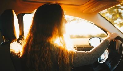 Woman driving and struggling with what to do about her bad marriage.