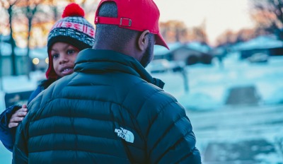 Father and son who have learned the benefits of co-parenting without power struggles.