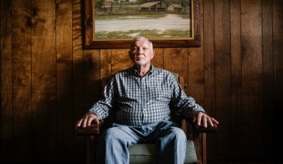 Man sitting alone and wondering how to get over a divorce after a long marriage.