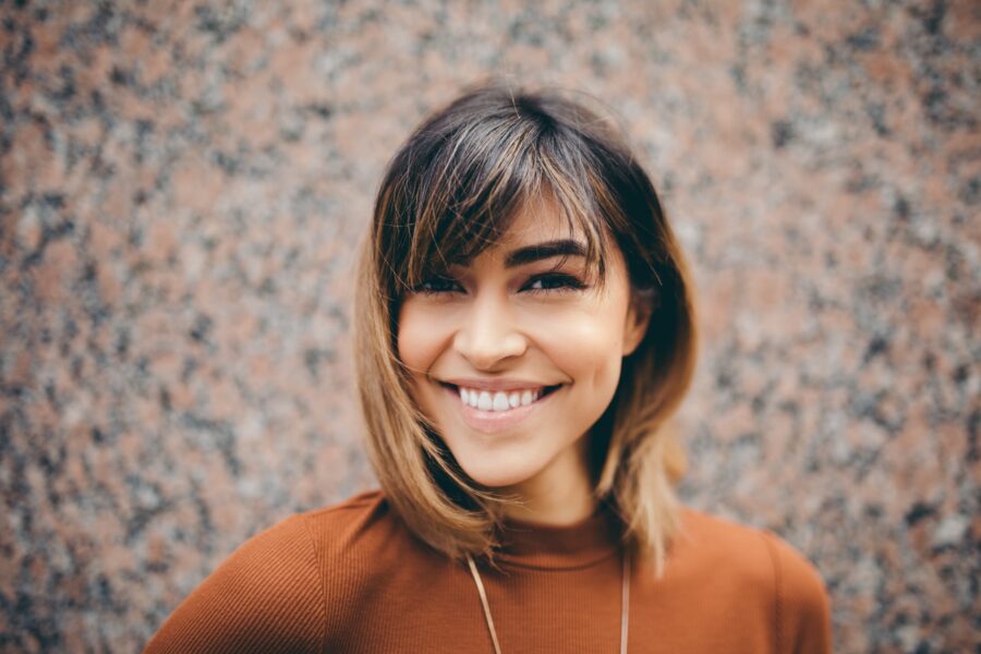 Emotional self-awareness is behind this woman’s smile.