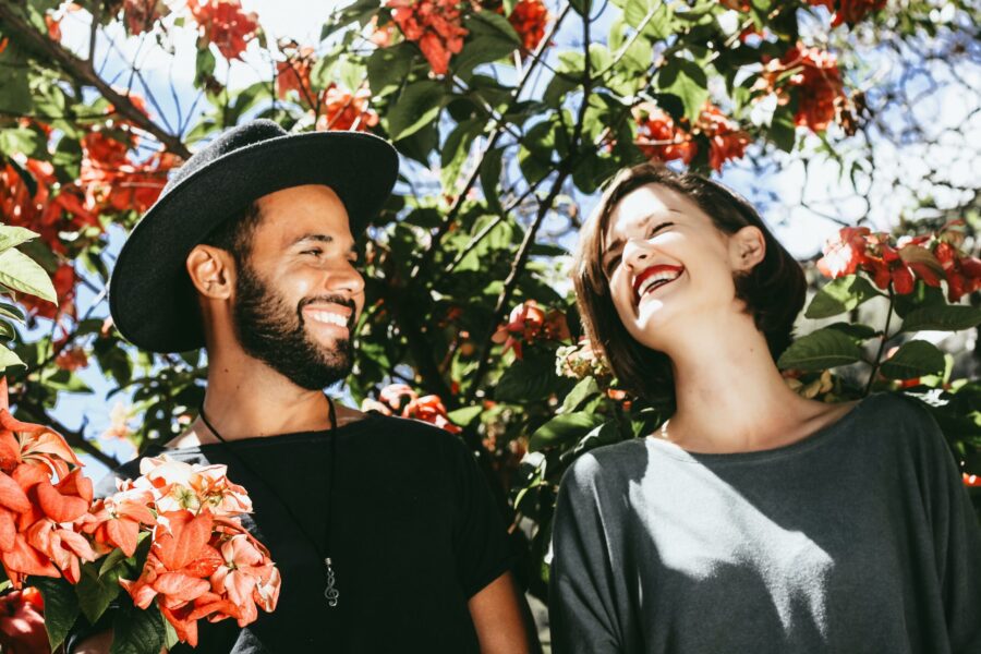 Smiling couple enjoying the benefits of self-awareness in their relationship.