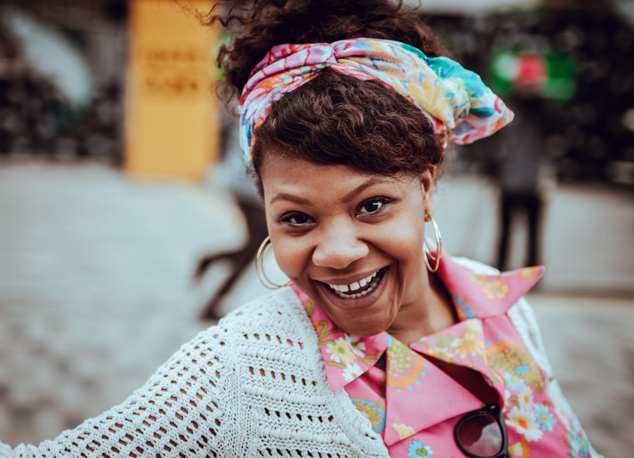 Woman feeling joyous because she’s practicing the best tips for a happy life.