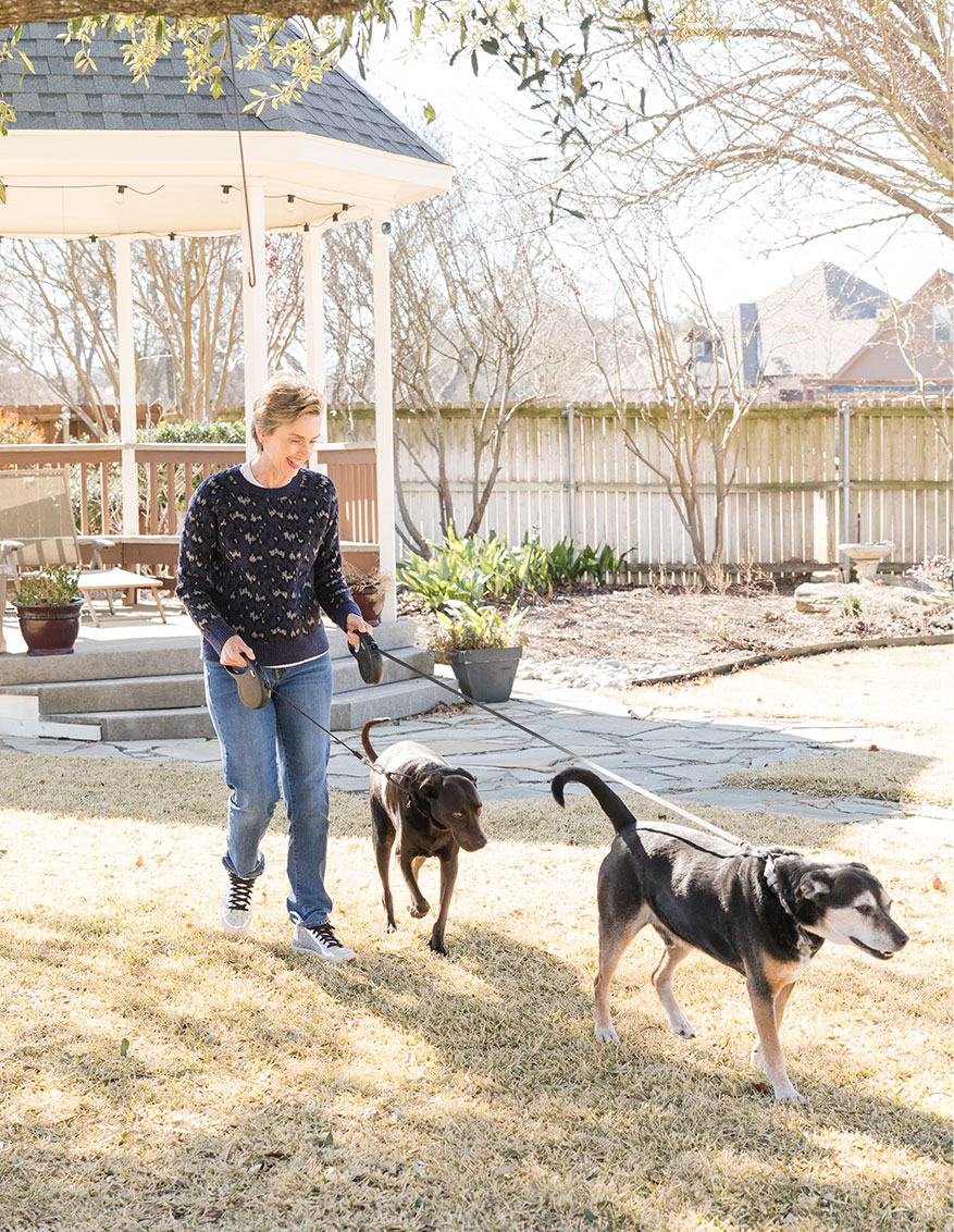 Life and divorce coach Karen Finn walking her dogs.
