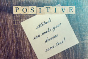 A positive, happy-life motivational quote: Positive attitude will make your dreams come true.